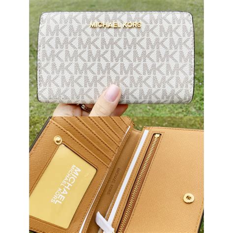 michael kors jet set vanilla wallet|bolso michael kors jet set.